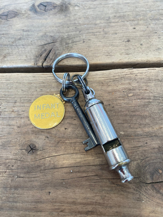 Infant medal and Whistle Key Ring